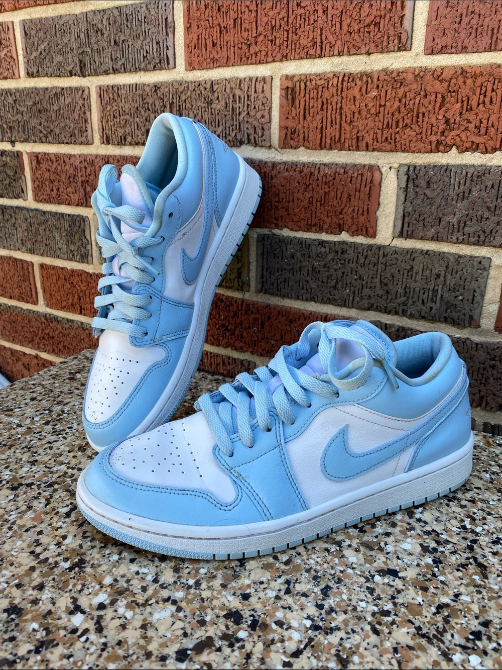 Nike Womenโs Low-Top Sneakers in Light Blue and White